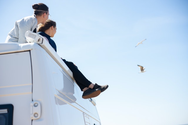 Sitting on a caravan roof