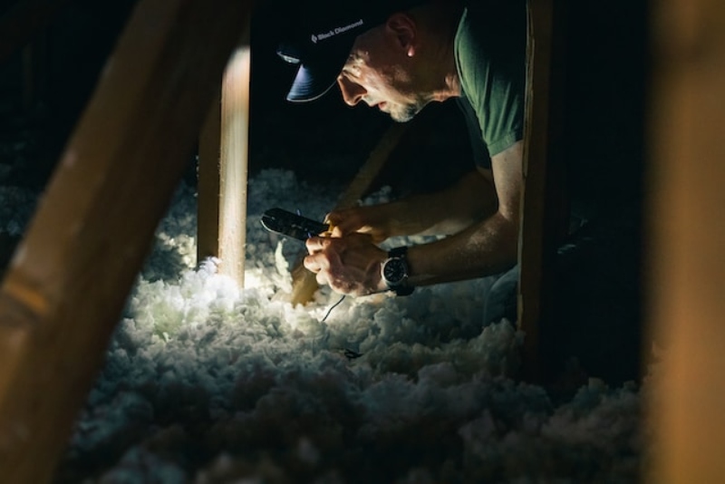 man accessing loft